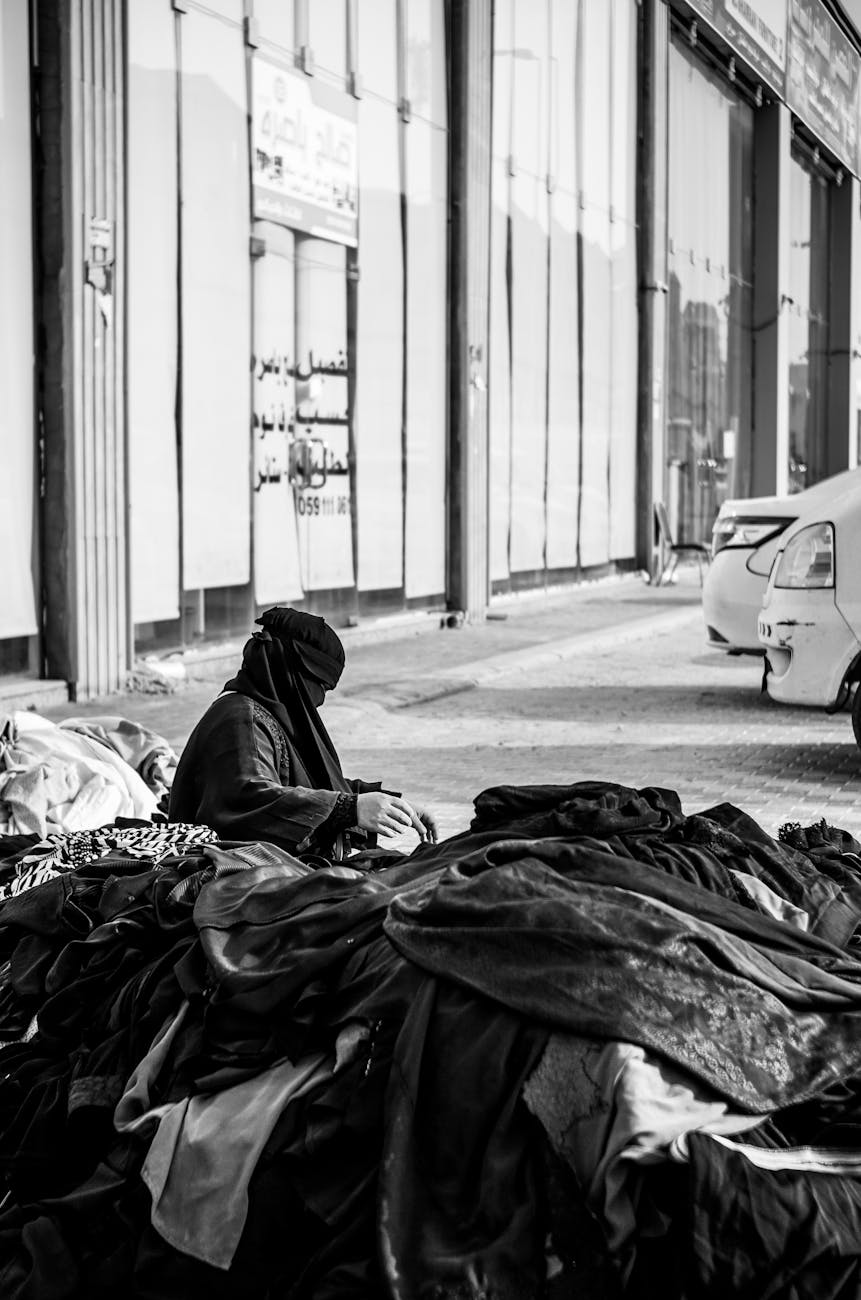 grayscale photo of woman wearing hijab