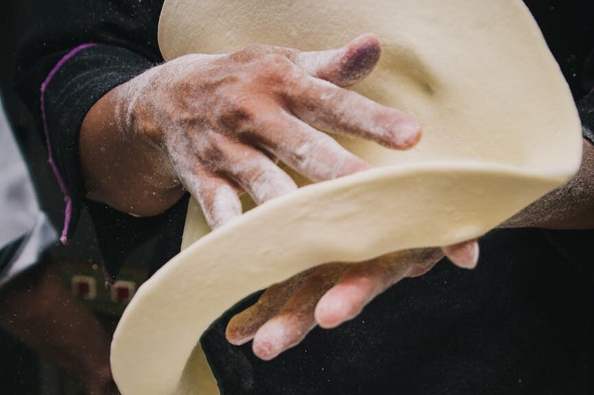 person making a dough